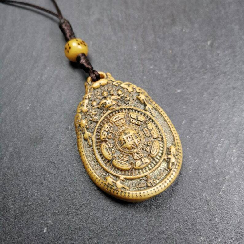Buddhist Calendar Amulet,Yak Bone Carved Melong Mirror,SIPAHO(srid pa ho) Badge - Gandhanra-ART