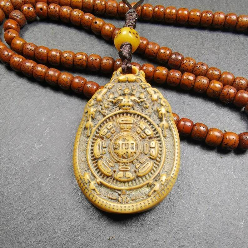 Buddhist Calendar Amulet,Yak Bone Carved Melong Mirror,SIPAHO(srid pa ho) Badge - Gandhanra-ART