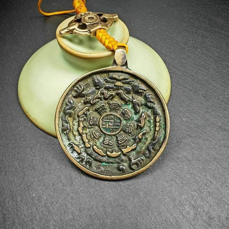 Amulet Sipaho Badge - Melong Mirror Calendar,45mm - Gandhanra-ART