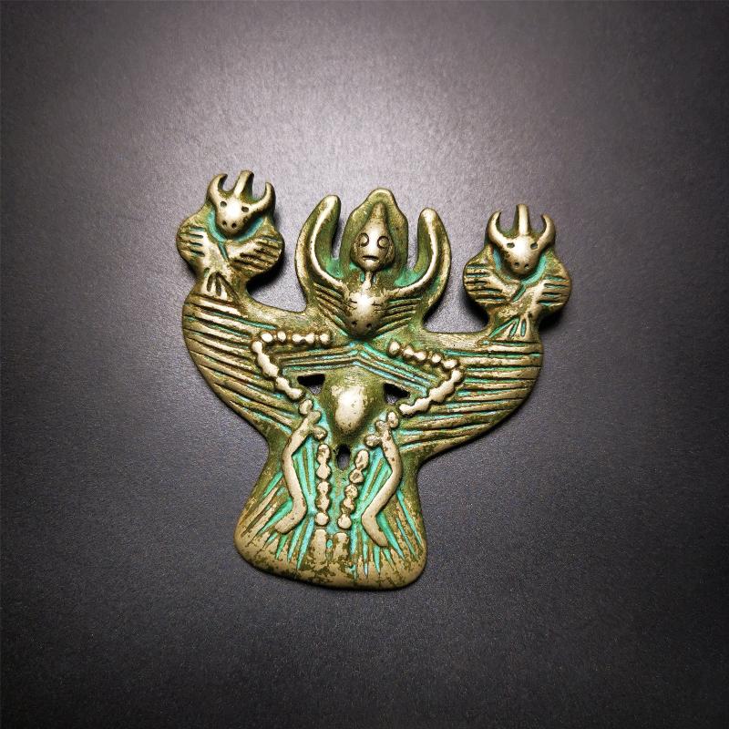 This Garuda is collected from Yaqing Monastery Baiyu County Tibet,it's a handmade badge,amulet pandent, made of copper,about 80 years old. You can wear it as amulet pendant, or make it into wall decoration, hang on the door as a protector,or just put it on your desk,as an ornament.