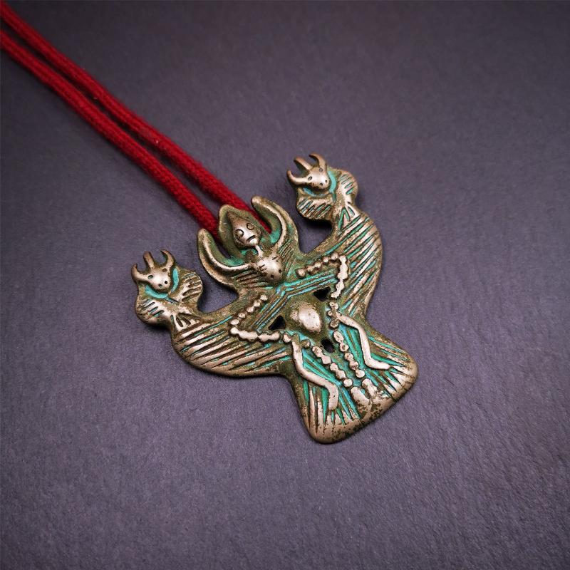 This Garuda is collected from Yaqing Monastery Baiyu County Tibet,it's a handmade badge,amulet pandent, made of copper,about 80 years old. You can wear it as amulet pendant, or make it into wall decoration, hang on the door as a protector,or just put it on your desk,as an ornament.