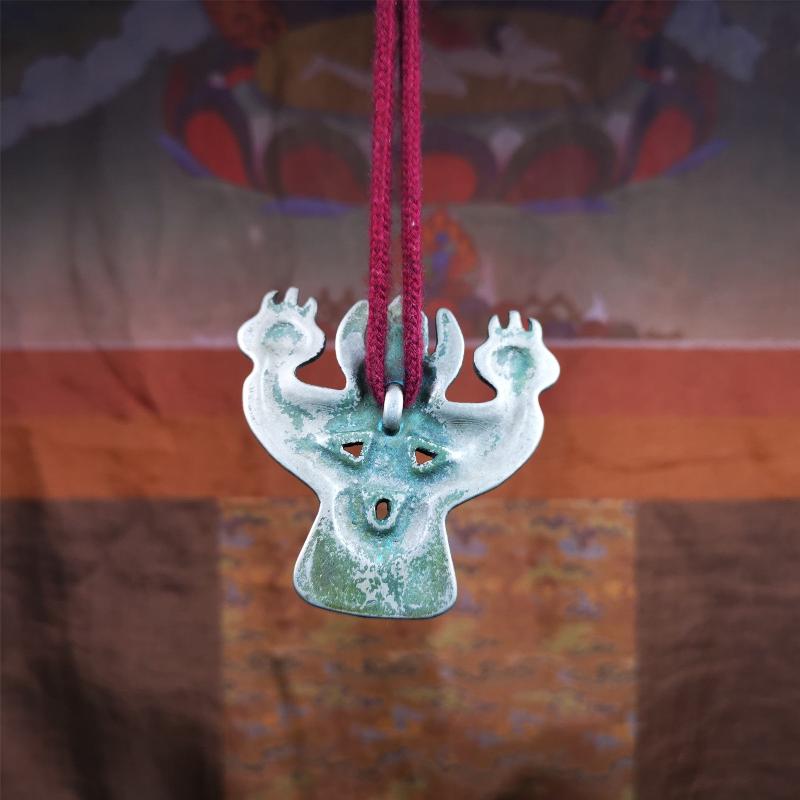 This Garuda is collected from Yaqing Monastery Baiyu County Tibet,it's a handmade badge,amulet pandent, made of copper,about 80 years old. You can wear it as amulet pendant, or make it into wall decoration, hang on the door as a protector,or just put it on your desk,as an ornament.