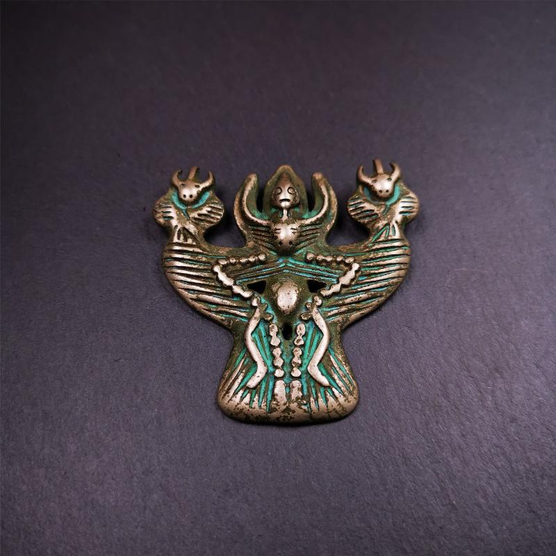 This Garuda is collected from Yaqing Monastery Baiyu County Tibet,it's a handmade badge,amulet pandent, made of copper,about 80 years old. You can wear it as amulet pendant, or make it into wall decoration, hang on the door as a protector,or just put it on your desk,as an ornament.