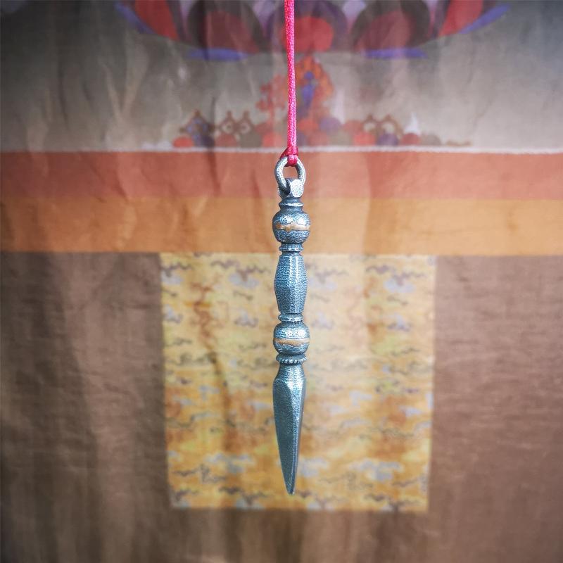 This handmade Dorje Phurba was crafted by Tibetan craftsmen from Hepo Town, Baiyu County, Tibet,known for its renowned Tibetan handicrafts. The upper part is a vajra, and the lower part is a phurba. Copper dots is inlaid on the waist of the phurba