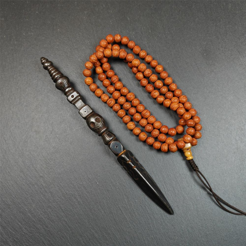 Gandhanra Tibetan Buddhist Ritual Implement - Kila -Dorje Phurba,Made of Cold Iron inlaid Copper,7.5".Its top is a stupa, in the middle is the skull Shmashana Adhipati, and at the bottom is a phurba,handmade by Tibetan craftsmen in 1990's.