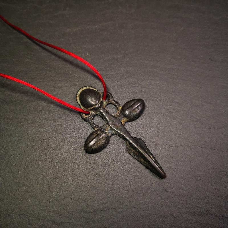 This beautiful phurba pendant is hand carved by Tibetan craftsmen from Tibet in 1960's. It is made of thokcha,full of black color,the upper part is a horizontal vajra, and the lower part is a phurba,size is 2.6 by 1.7 inches