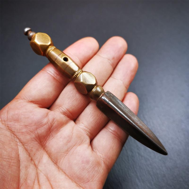 Gandhanra Handmade Tibetan Buddhist Ritual Implement - Kila -Dorje Phurba,Made of Cold Iron inlaid with Brass,5.1".The handle is made of brass and the blade is made of cold iron,very delicate.Handmade by Tibetan craftsmen from Tibet in 1990's.