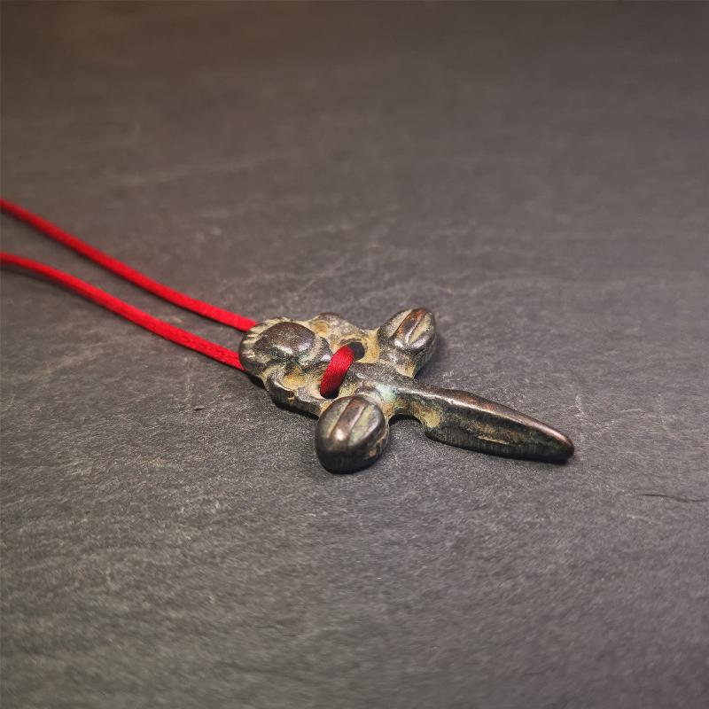 Gandhanra Tibetan Buddhist Ritual Implement - Kila -Dorje Phurba amulet pendant,a cross vajra in the middle,made of thokcha,black color, length about 1.57", handmade by Tibetan craftsmen from Tibet in 1960's.