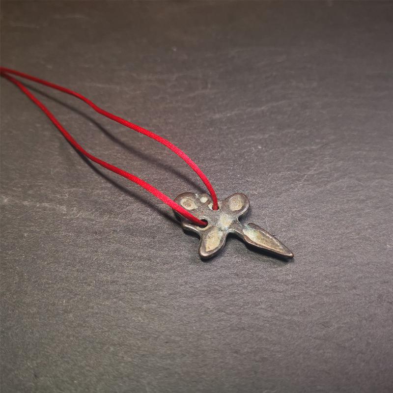 Gandhanra Tibetan Buddhist Ritual Implement - Kila -Dorje Phurba amulet pendant,a cross vajra in the middle,made of thokcha,black color, length about 1.57", handmade by Tibetan craftsmen from Tibet in 1960's.