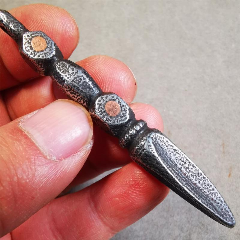 This handmade Dorje Phurba was crafted by Tibetan craftsmen from Hepo Town, Baiyu County, Tibet,known for its renowned Tibetan handicrafts. The upper part is a vajra, and the lower part is a phurba. Copper dots is inlaid on the waist of the phurba