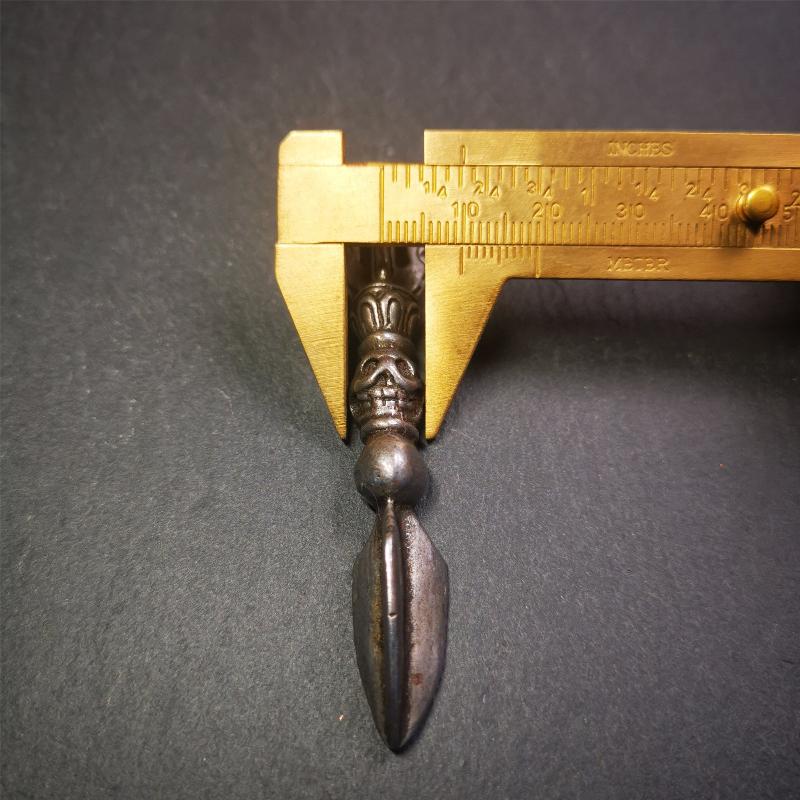 This phurba amulet was made of cold iron by Tibetan craftsmen in 1990's,its upper part is a vajra,and carved Shmashana Adhipati skull in the middle, the lower part is a Dorje Phurba,length is 3.0inches