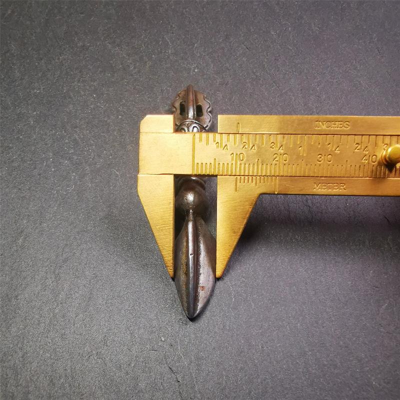This phurba amulet was made of cold iron by Tibetan craftsmen in 1990's,its upper part is a vajra,and carved Shmashana Adhipati skull in the middle, the lower part is a Dorje Phurba,length is 3.0inches