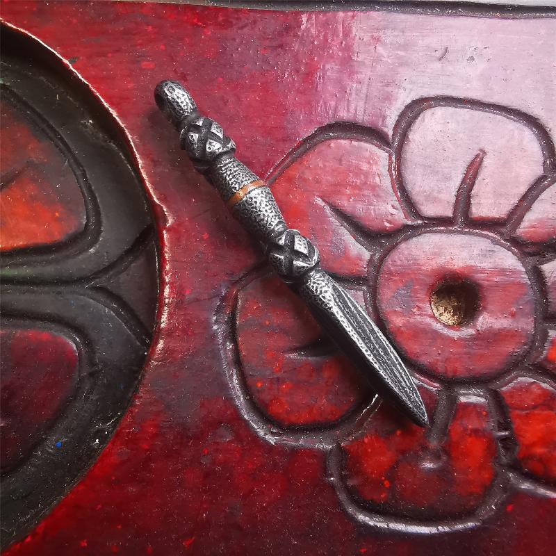 This handmade Dorje Phurba was crafted by Tibetan craftsmen from Hepo Town, Baiyu County, Tibet,known for its renowned Tibetan handicrafts. The upper part is a vajra, and the lower part is a phurba. A copper wire is inlaid on the waist of the phurba