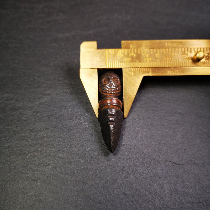 This phurba was made by Tibetan craftsmen and come from Hepo Town, Baiyu County, Tibet.Its upper part is Shmashana Adhipati skull, the lower part is a Dorje Phurba,and a copper wire inlaid on the waist of the phurba,made of cold iron