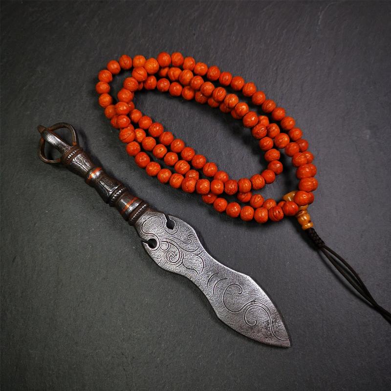This phurba kila is handmade by Tibetan craftsmen from Tibet in 2000's,from Hepo Town, Baiyu County, the birthplace of the famous Tibetan handicrafts.  It's a kila dagger,made of cold iron, carved cloud pattern, inlaid red copper, and the half vajra on the handle,very delicate.