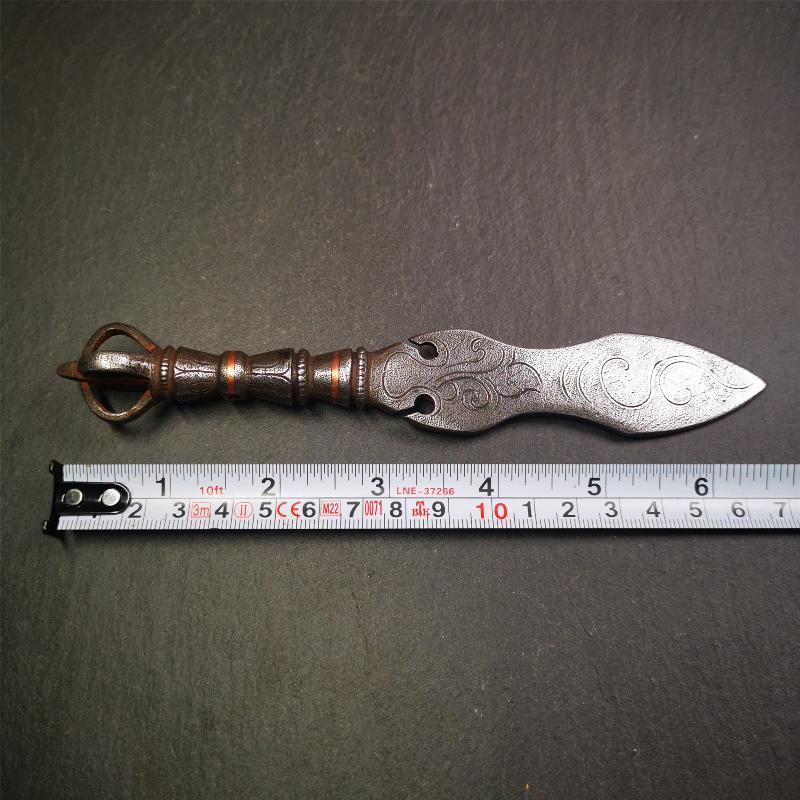 This phurba kila is handmade by Tibetan craftsmen from Tibet in 2000's,from Hepo Town, Baiyu County, the birthplace of the famous Tibetan handicrafts.  It's a kila dagger,made of cold iron, carved cloud pattern, inlaid red copper, and the half vajra on the handle,very delicate.