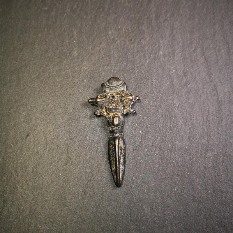 This beautiful phurba pendant was collected in Rejia Monastery,Baiyu,Tibet,about 70 years old.It was blessed by lama. It's made of thokcha, whole body is blcak,at the top is a mani jewel and horizontal vajra, the bottom is a vertical phurba