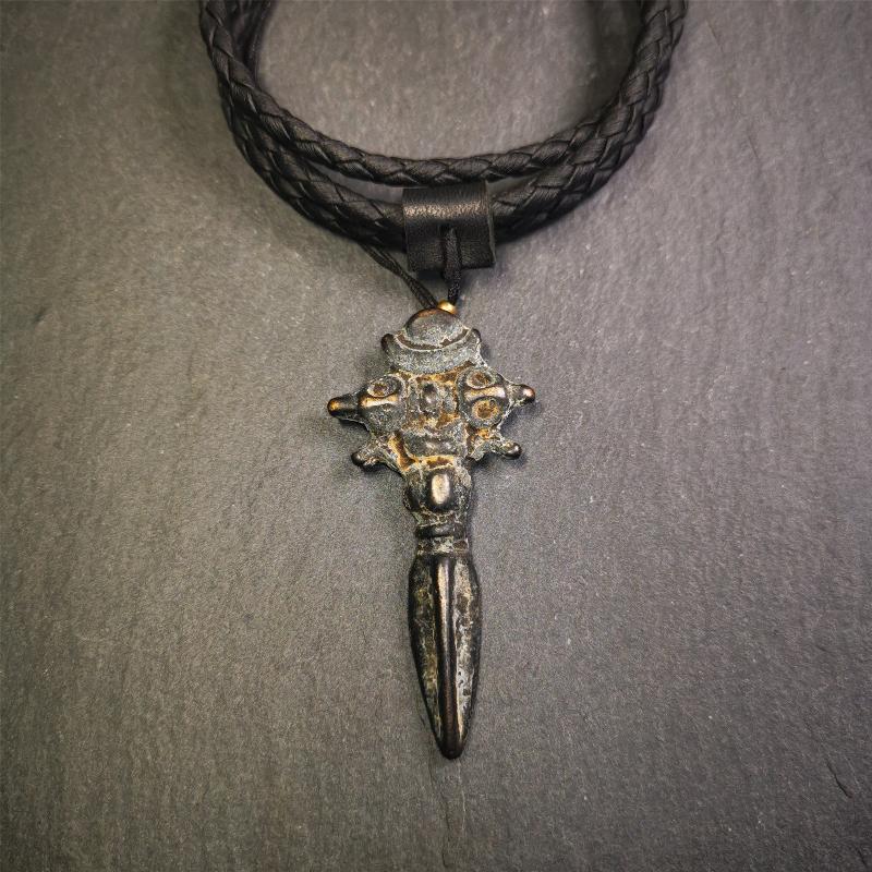 This beautiful phurba pendant was collected in Rejia Monastery,Baiyu,Tibet,about 70 years old.It was blessed by lama. It's made of thokcha, whole body is blcak,at the top is a mani jewel and horizontal vajra, the bottom is a vertical phurba