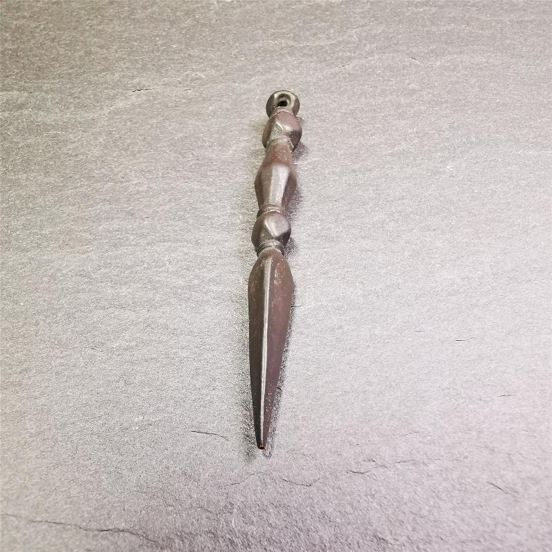 This handmade Dorje Phurba was crafted by Tibetan craftsmen from Hepo Town, Baiyu County, Tibet. The length is 2.2 inches,black color,the upper part is a vajra, and the lower part is a phurba.