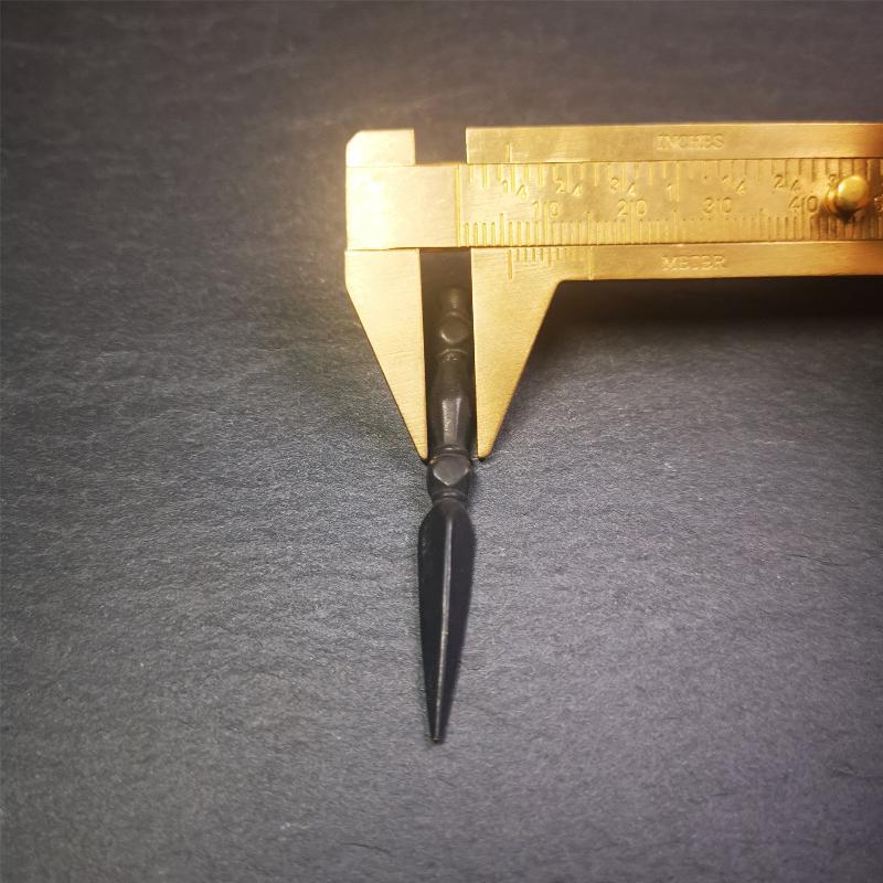 This handmade Dorje Phurba was crafted by Tibetan craftsmen from Hepo Town, Baiyu County, Tibet. The length is 2.2 inches,black color,the upper part is a vajra, and the lower part is a phurba.