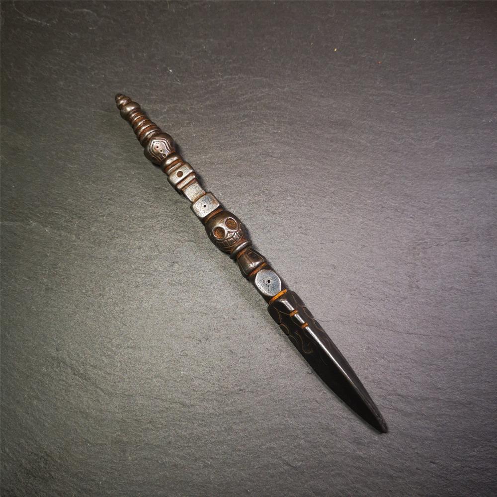 Gandhanra Tibetan Buddhist Ritual Implement - Kila -Dorje Phurba,Made of Cold Iron inlaid Copper,7.5".Its top is a stupa, in the middle is the skull Shmashana Adhipati, and at the bottom is a phurba,handmade by Tibetan craftsmen in 1990's.