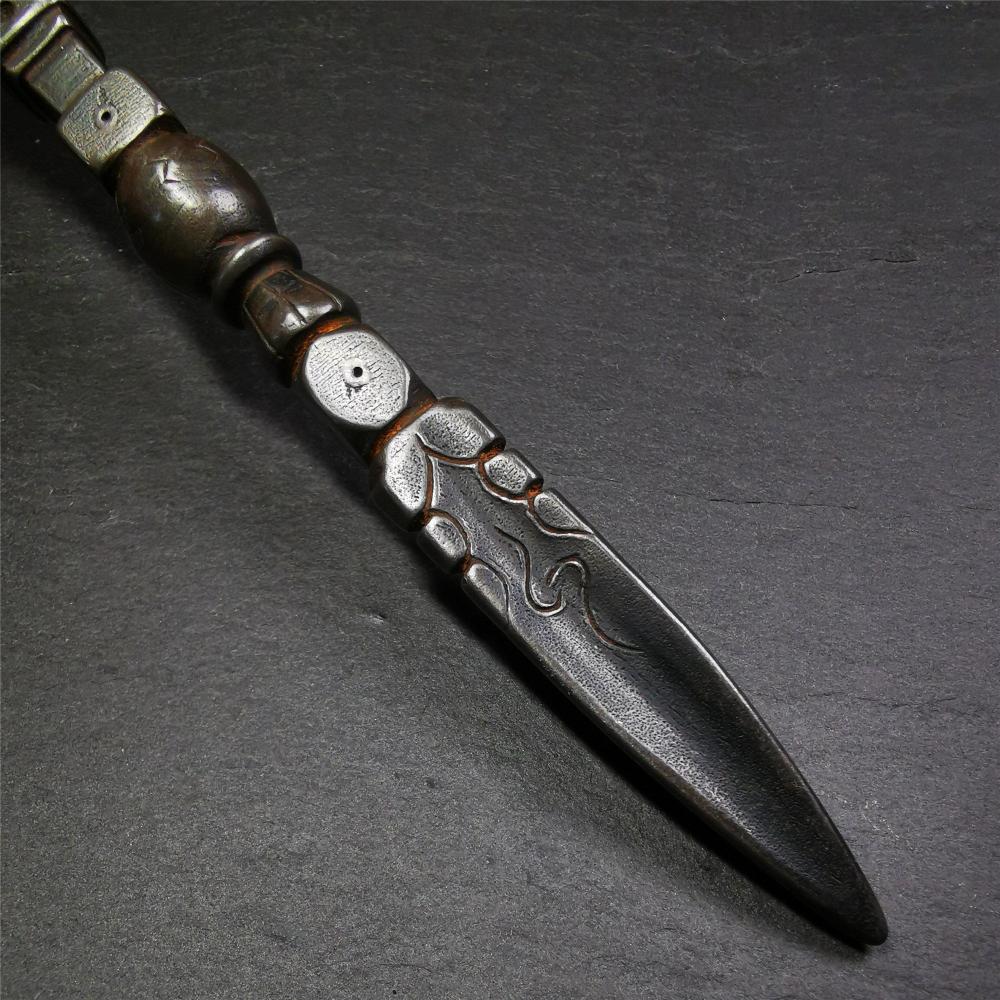 Gandhanra Tibetan Buddhist Ritual Implement - Kila -Dorje Phurba,Made of Cold Iron inlaid Copper,7.5".Its top is a stupa, in the middle is the skull Shmashana Adhipati, and at the bottom is a phurba,handmade by Tibetan craftsmen in 1990's.