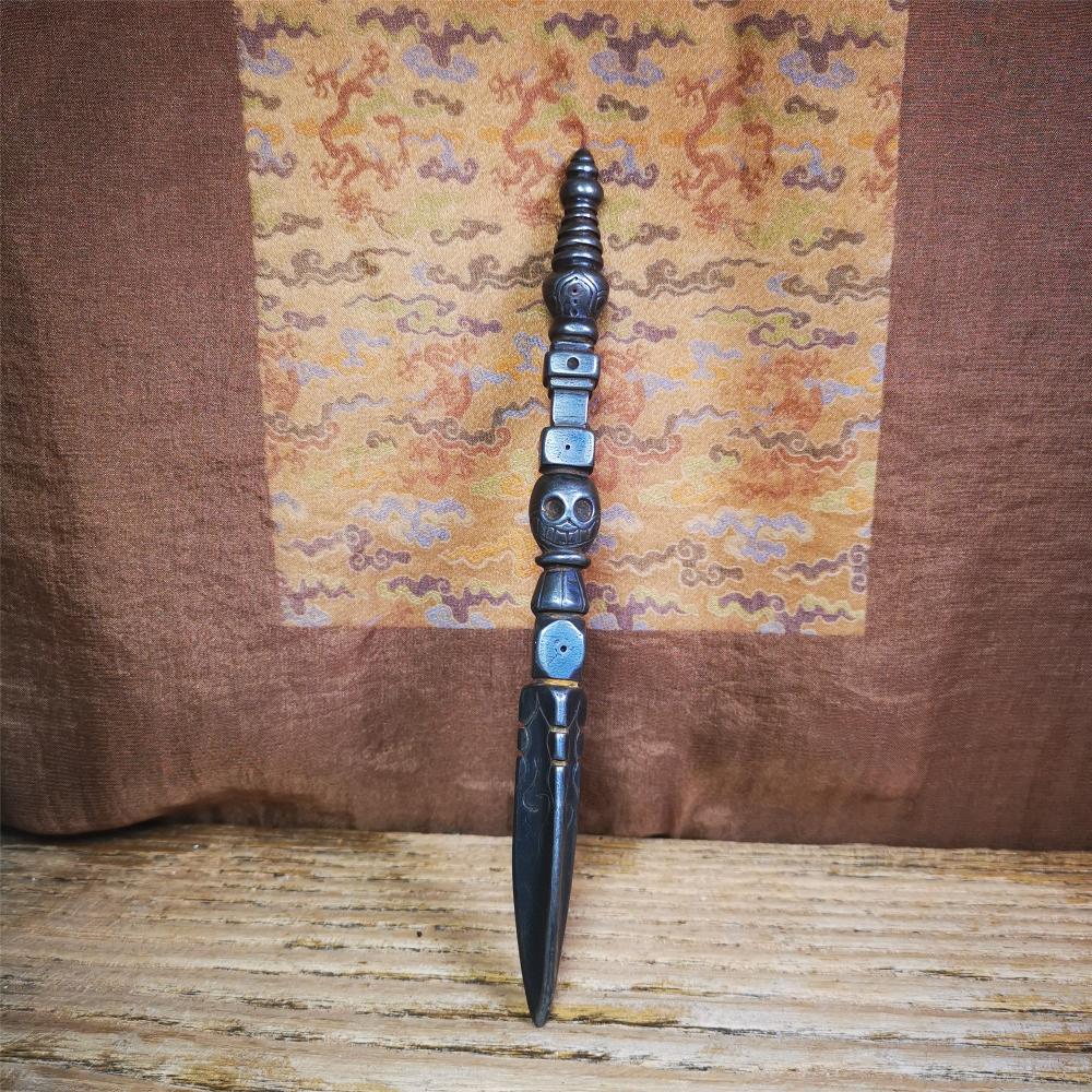 Gandhanra Tibetan Buddhist Ritual Implement - Kila -Dorje Phurba,Made of Cold Iron inlaid Copper,7.5".Its top is a stupa, in the middle is the skull Shmashana Adhipati, and at the bottom is a phurba,handmade by Tibetan craftsmen in 1990's.