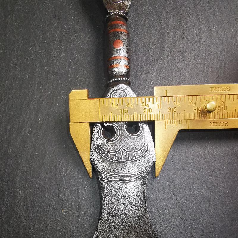 This vajra sword was handmade by Tibetan craftsmen from Tibet in 1990s,from Hepo Town, Baiyu County. It's a manjusri sword shape,flame shape blade,made of cold iron, carved conch pattern,and the vajra of the tail hanging ring