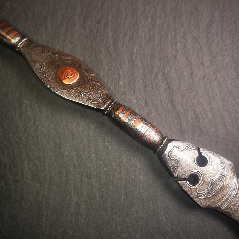 This vajra sword was handmade by Tibetan craftsmen from Tibet in 1990s,from Hepo Town, Baiyu County. It's a manjusri sword shape,flame shape blade,made of cold iron, carved conch pattern,and the vajra of the tail hanging ring