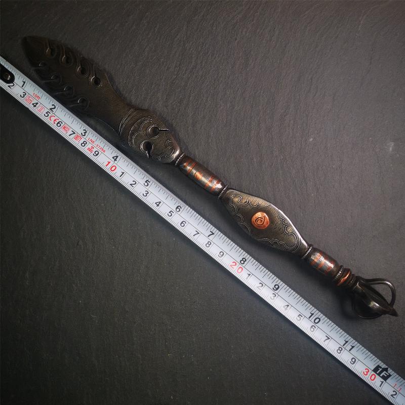This vajra sword was handmade by Tibetan craftsmen from Tibet in 1990s,from Hepo Town, Baiyu County. It's a manjusri sword shape,flame shape blade,made of cold iron, carved conch pattern,and the vajra of the tail hanging ring