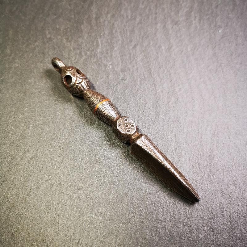 This phurba was made by Tibetan craftsmen and come from Hepo Town, Baiyu County, the birthplace of the famous Tibetan handicrafts. Its upper part is Shmashana Adhipati skull, the lower part is a Dorje Phurba,a dice in the middle,very delicate.