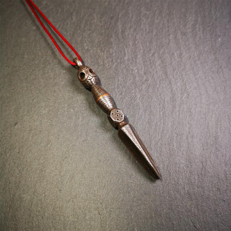 This phurba was made by Tibetan craftsmen and come from Hepo Town, Baiyu County, the birthplace of the famous Tibetan handicrafts. Its upper part is Shmashana Adhipati skull, the lower part is a Dorje Phurba,a dice in the middle,very delicate.