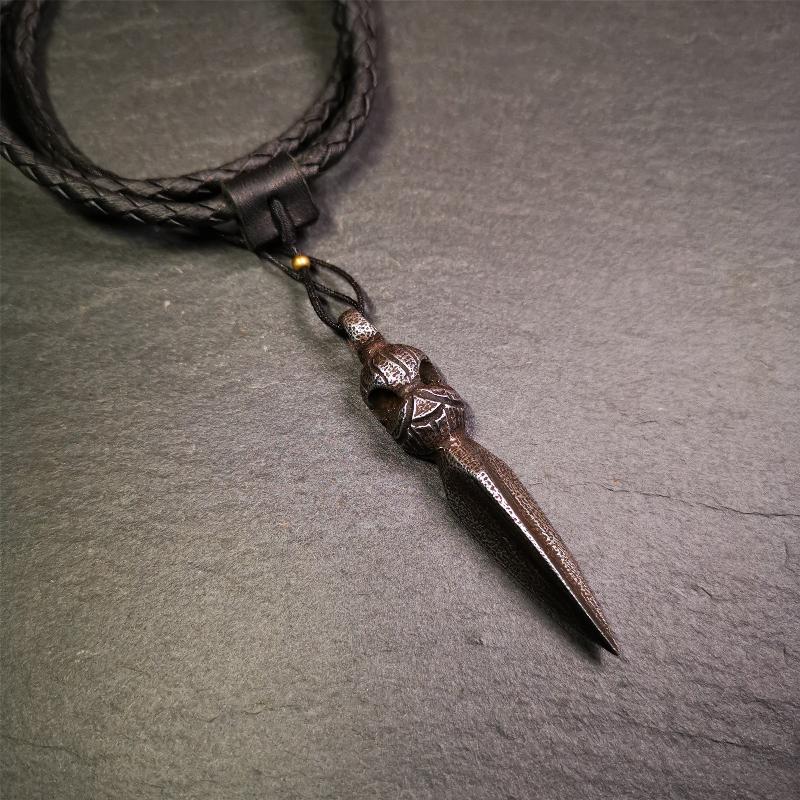 This phurba was made by Tibetan craftsmen and come from Hepo Town, Baiyu County, the birthplace of the famous Tibetan handicrafts. Its upper part is Shmashana Adhipati skull, the lower part is a Dorje Phurba