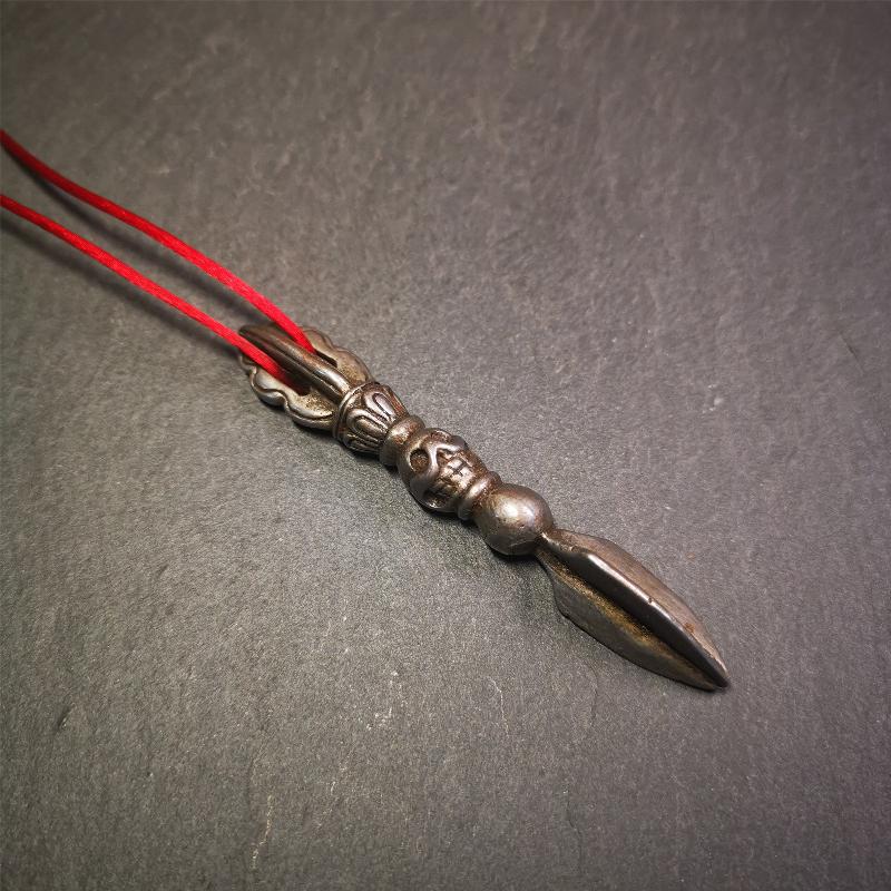 This phurba amulet was made of cold iron by Tibetan craftsmen in 1990's,its upper part is a vajra,and carved Shmashana Adhipati skull in the middle, the lower part is a Dorje Phurba,length is 3.0inches