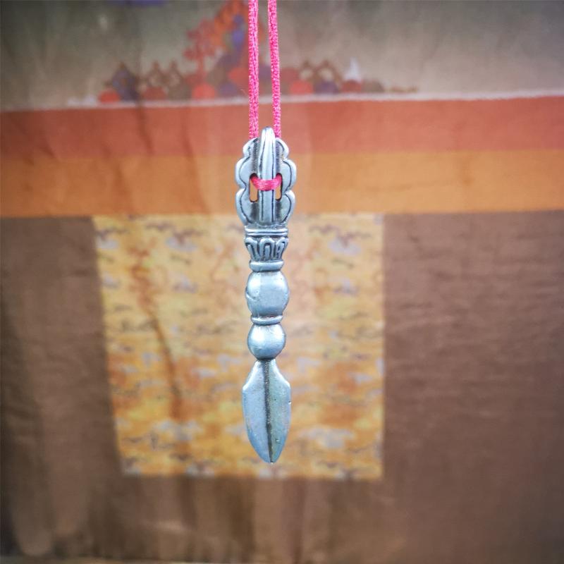 This phurba amulet was made of cold iron by Tibetan craftsmen in 1990's,its upper part is a vajra,and carved Shmashana Adhipati skull in the middle, the lower part is a Dorje Phurba,length is 3.0inches