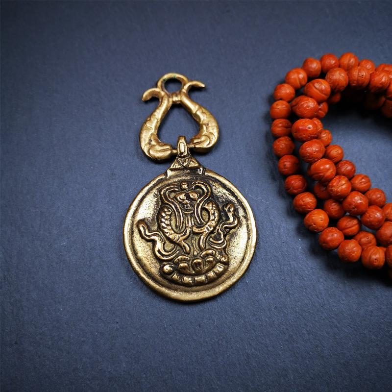 This Sipaho amulet was made by Tibetan craftsmen and come from Hepo Town, Baiyu County, Tibet. It is round shape,made of brass.Front pattern is Tibetan Budhist calendar symbol - SIPAHO(srid pa ho),the back is the gold fish and treasure vase symbol.