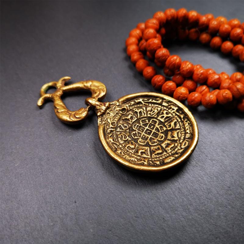 This Sipaho amulet was made by Tibetan craftsmen and come from Hepo Town, Baiyu County, Tibet. It is round shape,made of brass.Front pattern is Tibetan Budhist calendar symbol - SIPAHO(srid pa ho),the back is the gold fish and treasure vase symbol.