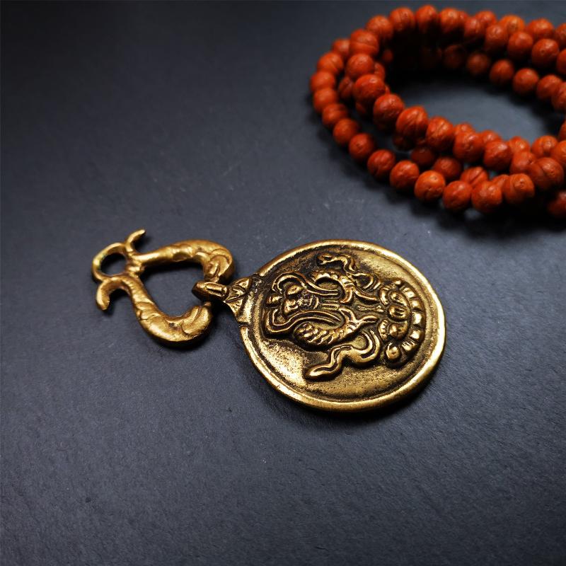 This Sipaho amulet was made by Tibetan craftsmen and come from Hepo Town, Baiyu County, Tibet. It is round shape,made of brass.Front pattern is Tibetan Budhist calendar symbol - SIPAHO(srid pa ho),the back is the gold fish and treasure vase symbol.