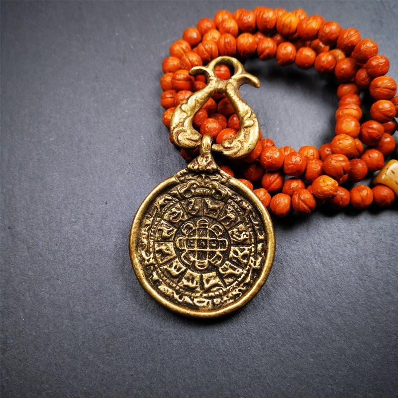 This Sipaho amulet was made by Tibetan craftsmen and come from Hepo Town, Baiyu County, Tibet.  It is round shape,made of brass.Front pattern is Tibetan Budhist calendar symbol - SIPAHO(srid pa ho),the back is the gold fish and treasure vase symbol.