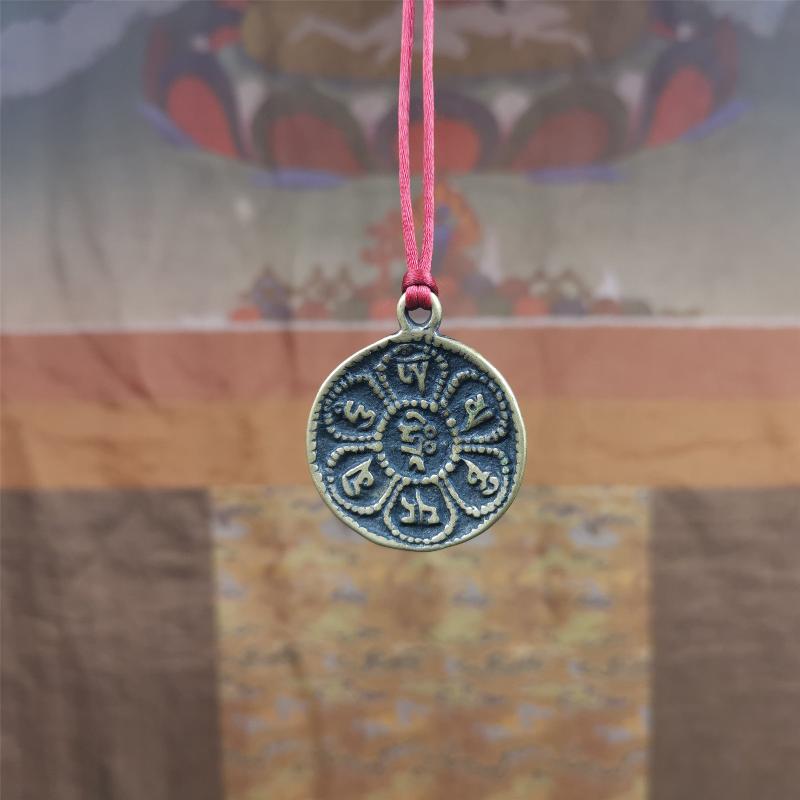 This om badge was made by Tibetan craftsmen and come from Hepo Town, Baiyu County, the birthplace of the famous Tibetan handicrafts. It is round, made of brass or white copper, 1.26 inches,carved with mantra of chenrezig OM MANI PADME HUM.