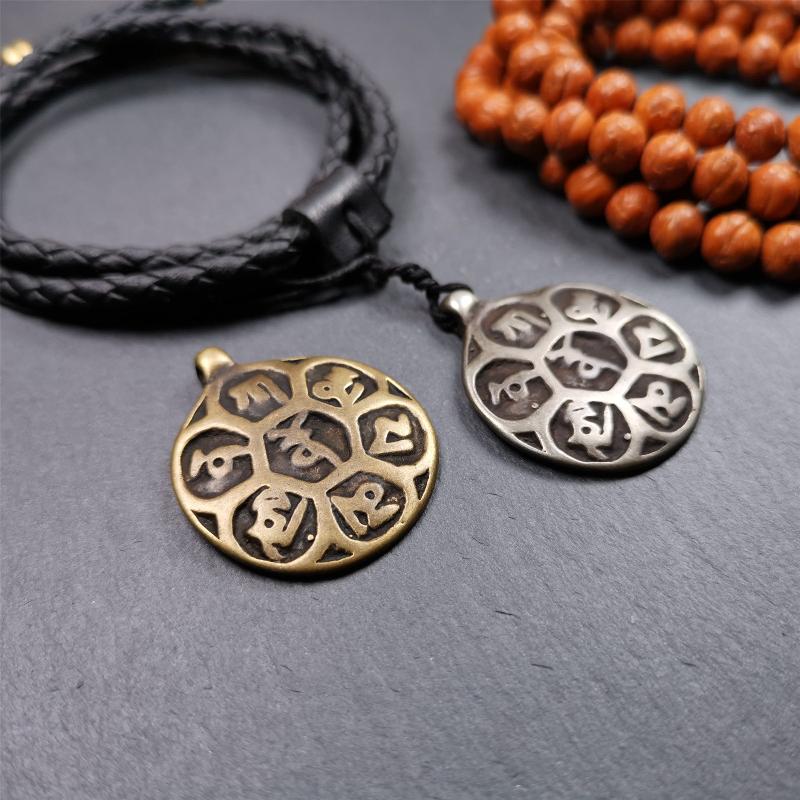 This badge was made by Tibetan craftsmen and come from Hepo Town, Baiyu County, the birthplace of the famous Tibetan handicrafts. It is made of brass, 1.26 inches,carved with mantra of chenrezig OM MANI PADME HUM.
