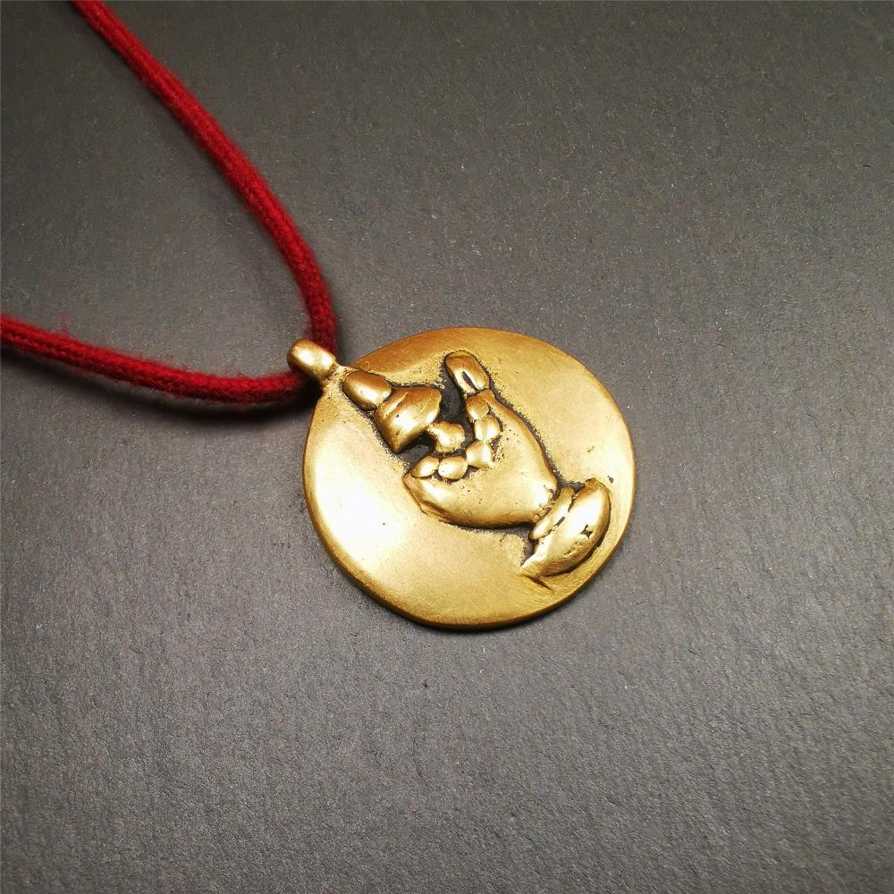 This unique Sipaho amulet was collected from Kathok Monastery,about 40 years old,bless by lama. It is round shape,made of copper,1.77 inch diameter.The front pattern is Tibetan Budhist calendar symbol - SIPAHO(srid pa ho),the back is a treasure vase.