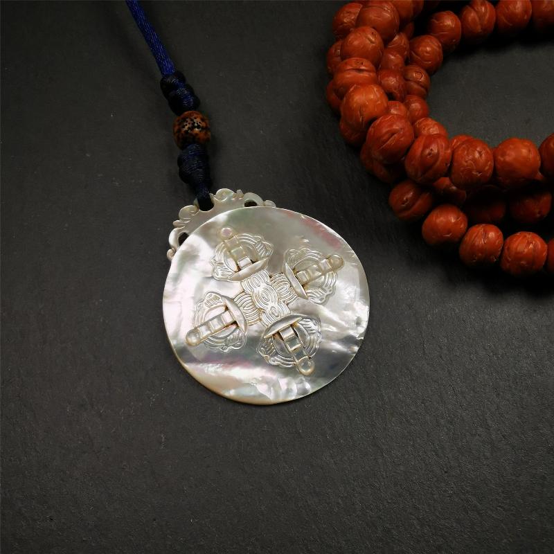 This unique Sipaho amulet was collected from Derge Parkhang Tibet about 80 years old. It was carved from shell,in different light and angles, it will emit unparalleled psychedelic colors.The front pattern is Tibetan Budhist calendar symbol - SIPAHO(srid pa ho),the back is cross vajra.