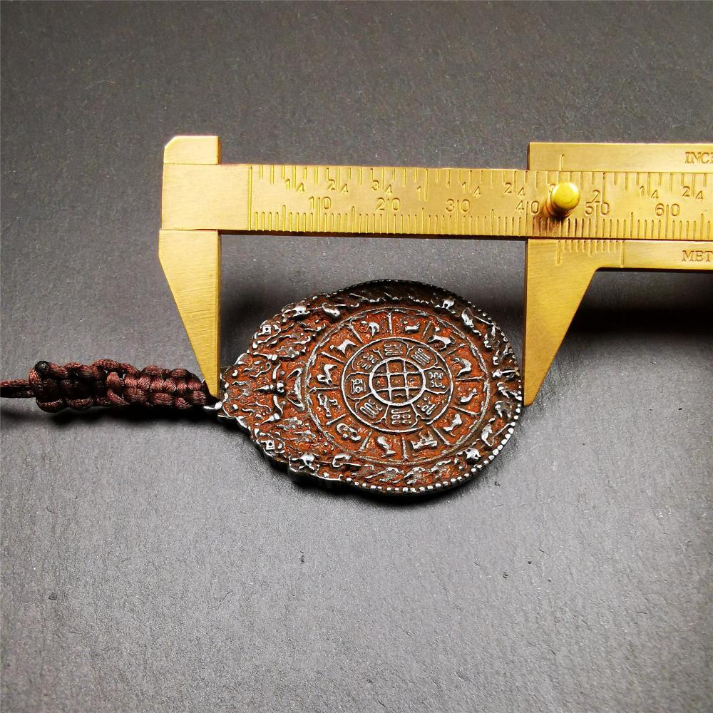 This unique melong badge was collected from Rejia Monastery,it was sacred amulets used present to believers,during a grand Dharma gathering,consecrated and blessed by lama. It is made of cold iron and 2 sided patterns.The front is Tibetan Budhist amulet symbol - SIPAHO,the back is cross vajra pattern and Ashtamangala