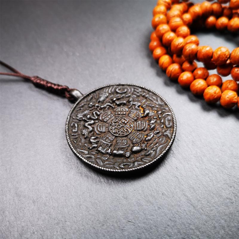 This unique melong badge was collected from Rejia Monastery. It's a Astrology Protective Amulet Pendant,made of thokcha and carved 2 sided pattern. The shape is Tibetan Budhist amulet badge - SIPAHO. The front is calendar pattern, and the back is elephant.
