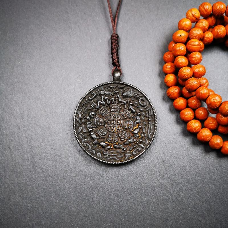 This unique melong badge was collected from Rejia Monastery. It's a Astrology Protective Amulet Pendant,made of thokcha and carved 2 sided pattern. The shape is Tibetan Budhist amulet badge - SIPAHO. The front is calendar pattern, and the back is elephant.
