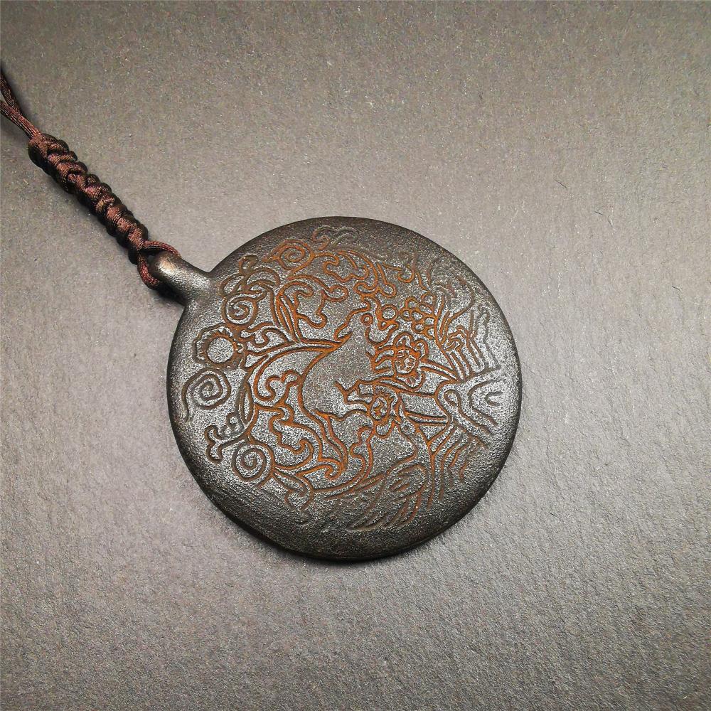 This unique melong badge was collected from Rejia Monastery. It's a Astrology Protective Amulet Pendant,made of thokcha and carved 2 sided pattern. The shape is Tibetan Budhist amulet badge - SIPAHO. The front is calendar pattern, and the back is elephant.
