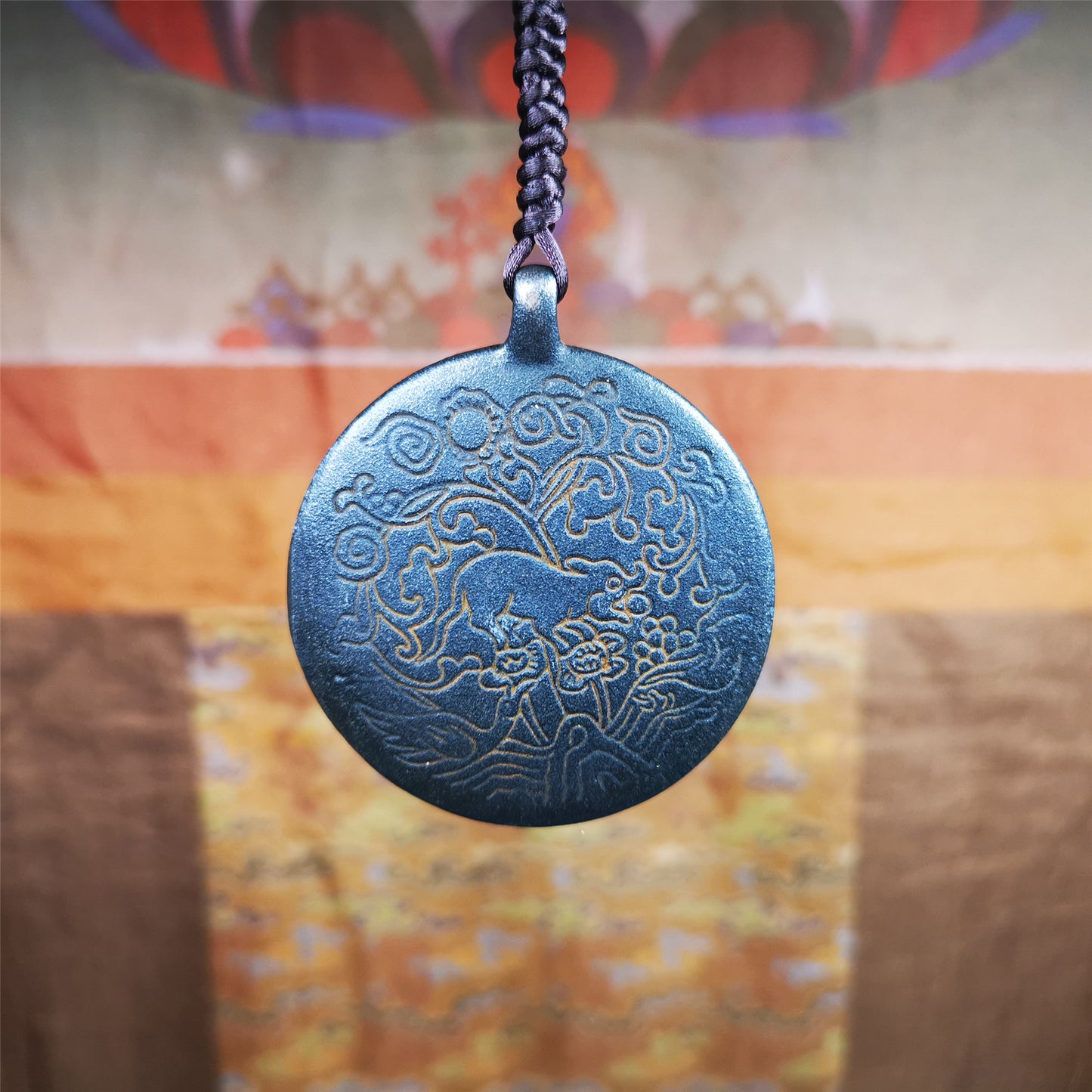 This unique melong badge was collected from Rejia Monastery. It's a Astrology Protective Amulet Pendant,made of thokcha and carved 2 sided pattern. The shape is Tibetan Budhist amulet badge - SIPAHO. The front is calendar pattern, and the back is elephant.