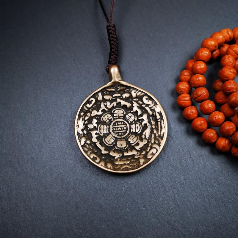 This type of sipaho badge was made by Tibetan craftsmen and come from Hepo Town, Baiyu County, the birthplace of the famous Tibetan handicrafts. It is made of lima brass,1.88 inch diameter,the front is Tibetan Budhist amulet symbol - Melong.