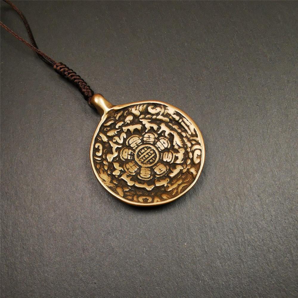This type of sipaho badge was made by Tibetan craftsmen and come from Hepo Town, Baiyu County, the birthplace of the famous Tibetan handicrafts. It is made of lima brass,1.88 inch diameter,the front is Tibetan Budhist amulet symbol - Melong.